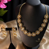 Zareen Oval Kundan Necklace & Earring Set