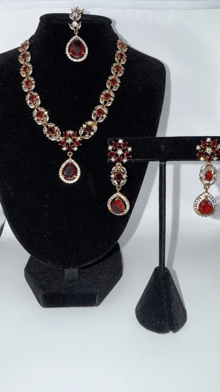 Elegant Ruby Red Jewelry Set with Matching Earrings & Tikka