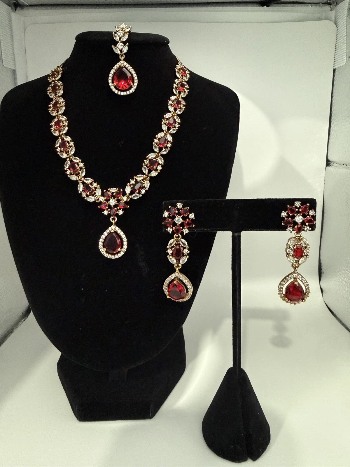 Elegant Ruby Red Jewelry Set with Matching Earrings & Tikka