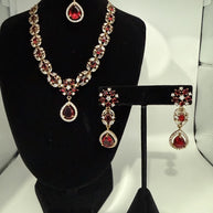 Elegant Ruby Red Jewelry Set with Matching Earrings & Tikka