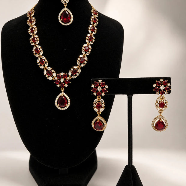 Elegant Ruby Red Jewelry Set with Matching Earrings & Tikka