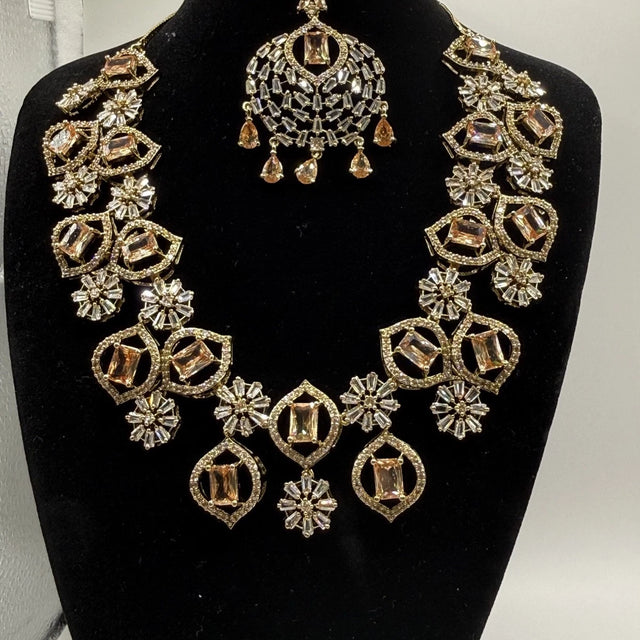 Elegant Champagne Gold Jewelry Set with Matching Earrings & Tikka