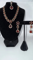 Elegant Ruby Red Jewelry Set with Matching Earrings & Tikka