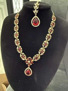 Elegant Ruby Red Jewelry Set with Matching Earrings & Tikka