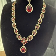 Elegant Ruby Red Jewelry Set with Matching Earrings & Tikka
