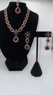 Elegant Ruby Red Jewelry Set with Matching Earrings & Tikka
