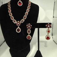 Elegant Ruby Red Jewelry Set with Matching Earrings & Tikka