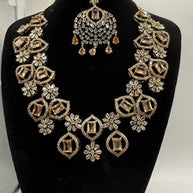 Elegant Champagne Gold Jewelry Set with Matching Earrings & Tikka