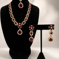 Elegant Ruby Red Jewelry Set with Matching Earrings & Tikka